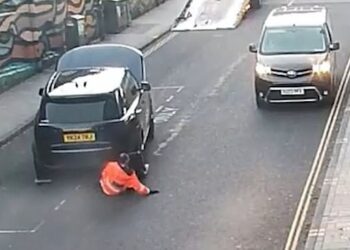 Moment Range Rover rolls down hill and crushes recovery worker