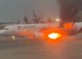 Passenger jet engine shoots out flames before takeoff