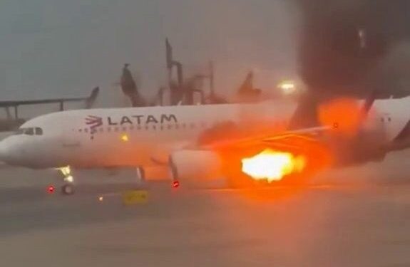 Passenger jet engine shoots out flames before takeoff